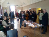 Enjoying biscuits in Monewden Village Hall following the South-East District Practice.