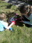 Alfie & Ruthie doing science in the garden.
