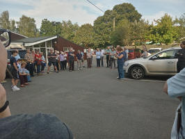 Katharine Salter giving the results outside Horringer Community Centre.