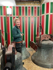 Pauline Brown with three of the bells.