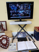  The live feed of the bells & ringing chamber, the trophy and a copy of 'Shake my hand and I'll you the ropes.