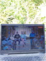 Watching the National 12-bell Striking Contest Final from our garden.