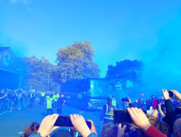 Welcoming the coach.