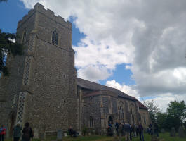 Outside at Wickham Skeith listening to the ringing during the Guild 6-bell Striking Competitions.