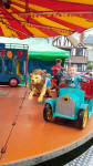 Alfie on a ride at Aldeburgh Carnival.