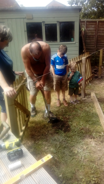 Fence building in our new garden.