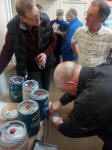  Jed Flatters pours beer whilst Chris McCarthy and Nigel Gale wait patiently.
