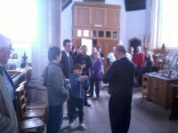 Mason helps Jed Flatters make the draw for the Rose Trophy at Southwold.