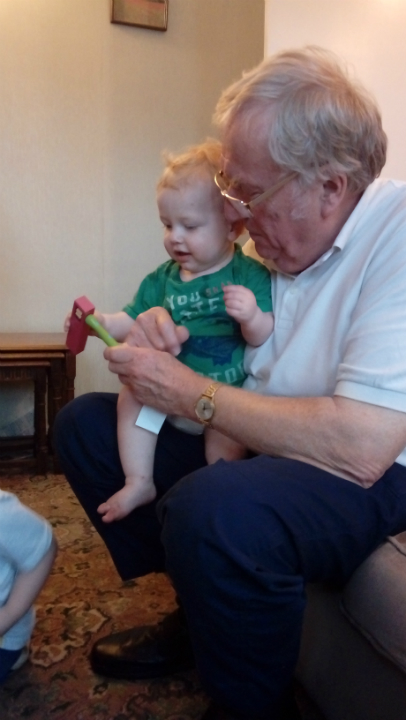  Joshua with his Grandad Alan on his first birthday.