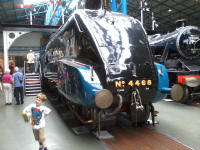Mason enjoying the National Railway Musuem in York in front of Mallard.