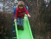 Mason's on his slide. Click for a bigger picture. Mason's on his slide.