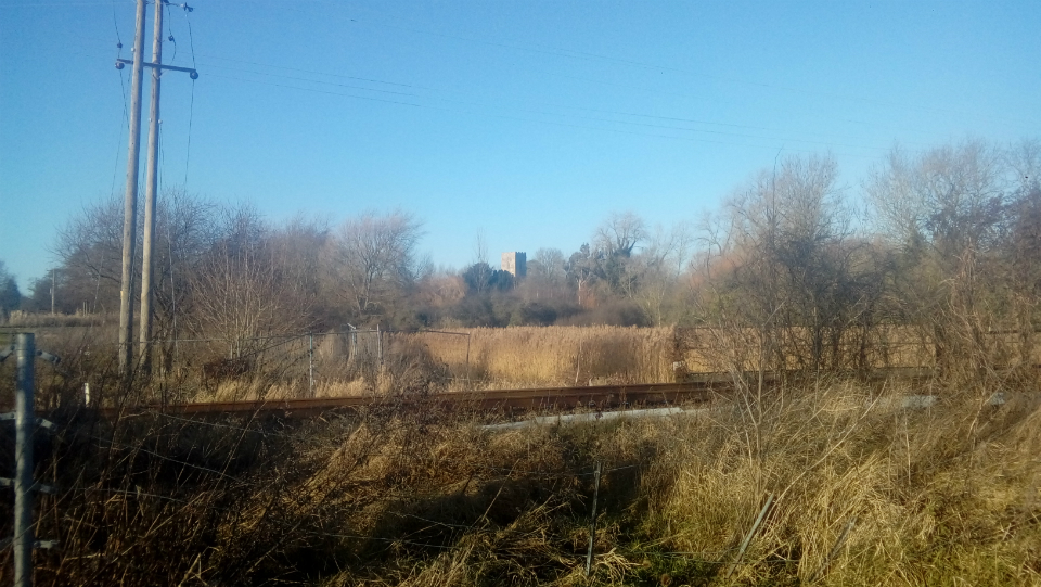 Melton Old Church from across the Ipswich-Lowestoft railway line.