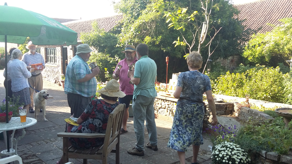Stephen Pettman, Jonathan Williamson & Brian Whiting ringing handbells at the Offton BBQ.