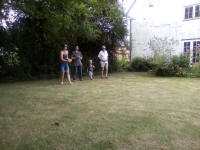 Playing boules at the Offton BBQ.