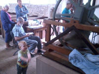 Alfie having a go on the model bell at Pettistree.