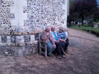 Stephen Cheek, George Pipe and Diana Pipe listening outside