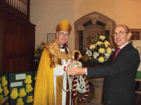 Click to see a bigger picture Bishop Clive with David Ray, Bells Group Chairman