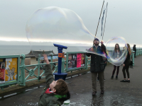 Mason popping bubbles.