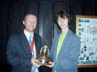 The Lester Brett Trophy being presented to Michael Carruthers of Debenham by the Guild Ringing Master, Richard J Munnings Picture of The Lester Brett Trophy being presented to Michael Carruthers of Debenham by the Guild Ringing Master, Richard J Munnings