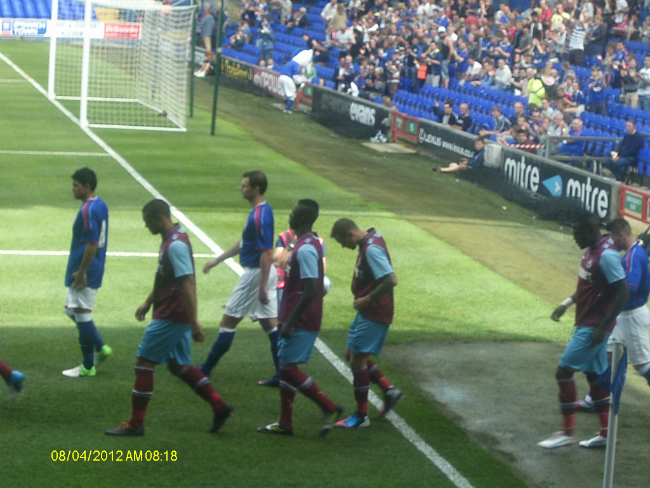 The players come out.